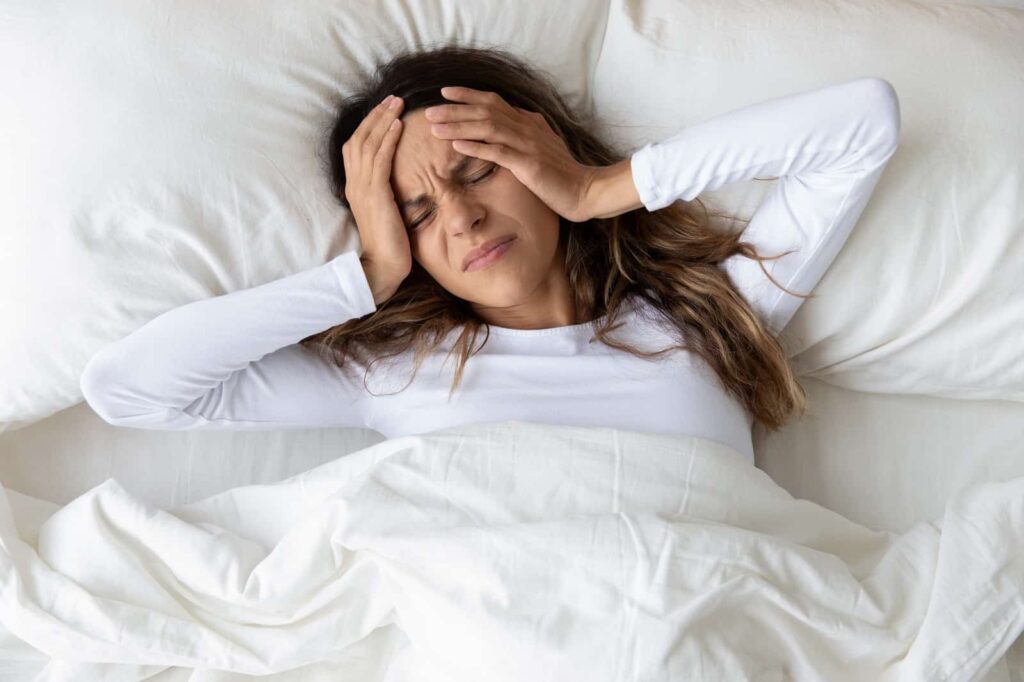 heavy head or headache due to oversleeping